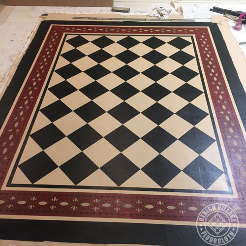 Diamonds with Farnum House border floorcloth