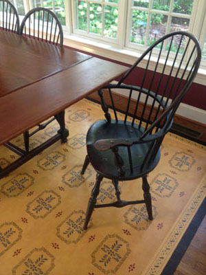 Close up picture of Bump Tavern Floorcloth in Dining room setting.